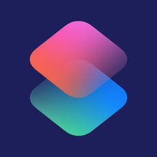 Shortcuts' icon is a solid royal blue background with two squares. The squares are skewed so that they look like a 3D cube without the sides. The top square is a salmon pink colour and the bottom is a turquoise. The bottom of the top square fades into the top of the bottom square which gives it a vague visual S look